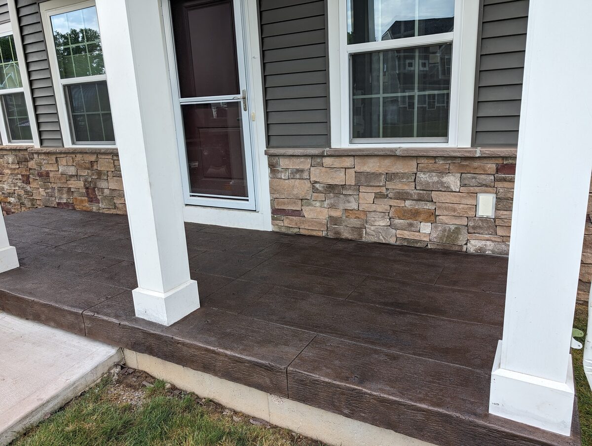 Stamped concrete front porch entryway completed in Central New York